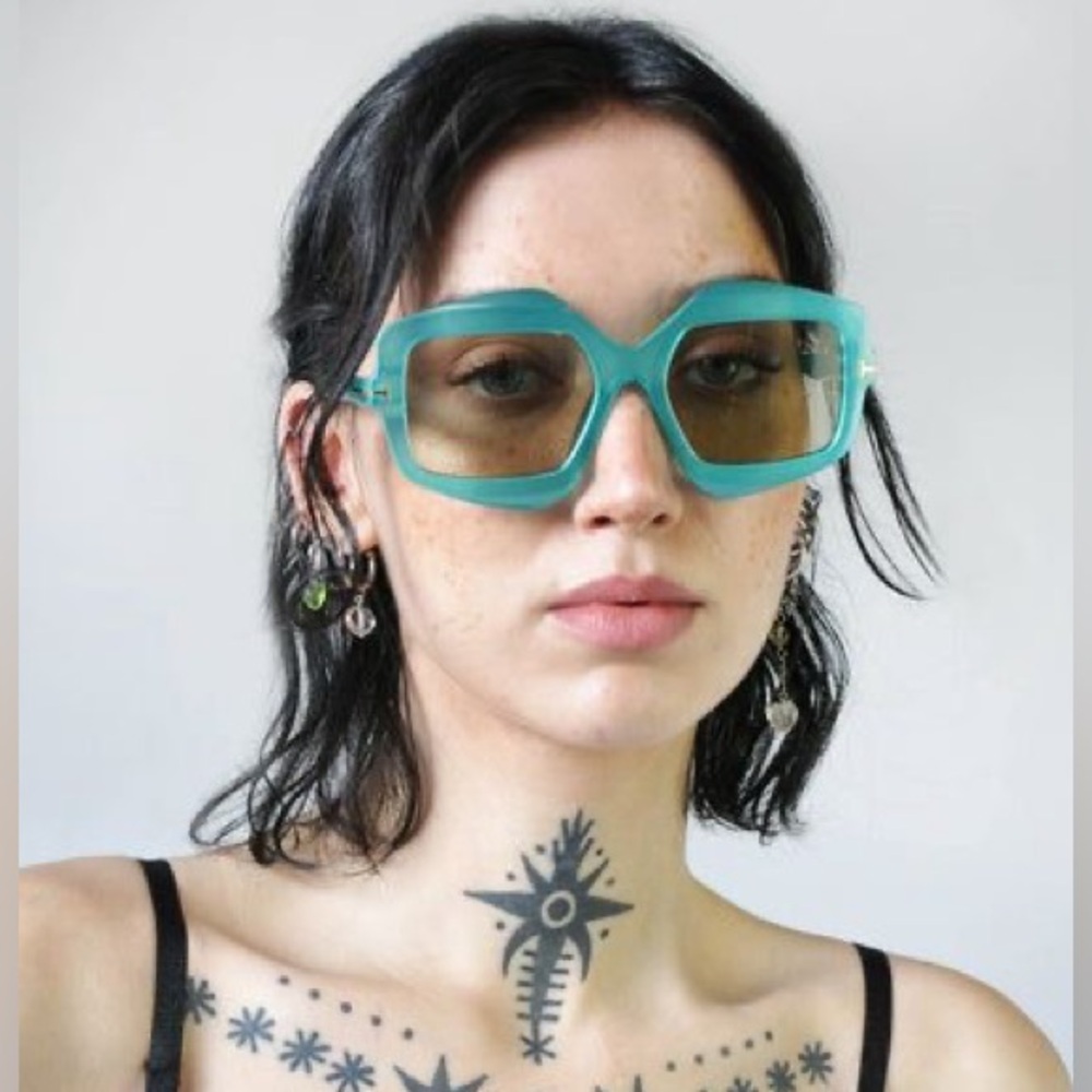 Funky, turquoise geometric “no way” sunglasses from Noctex.